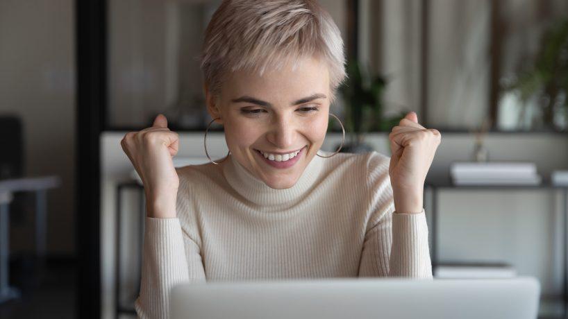 Employee read email feels excited by got promotion career growth